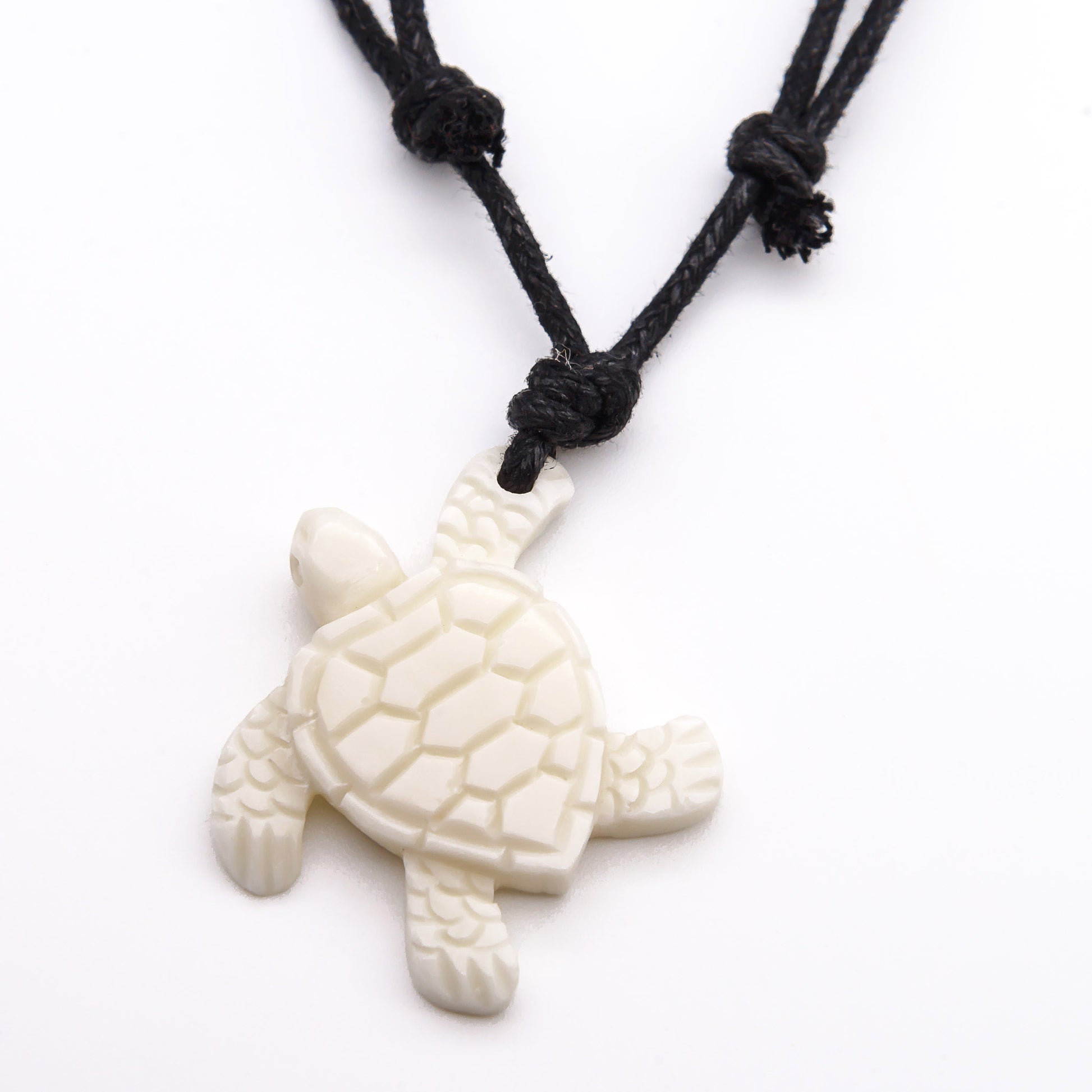 carved bone sea turtle necklace