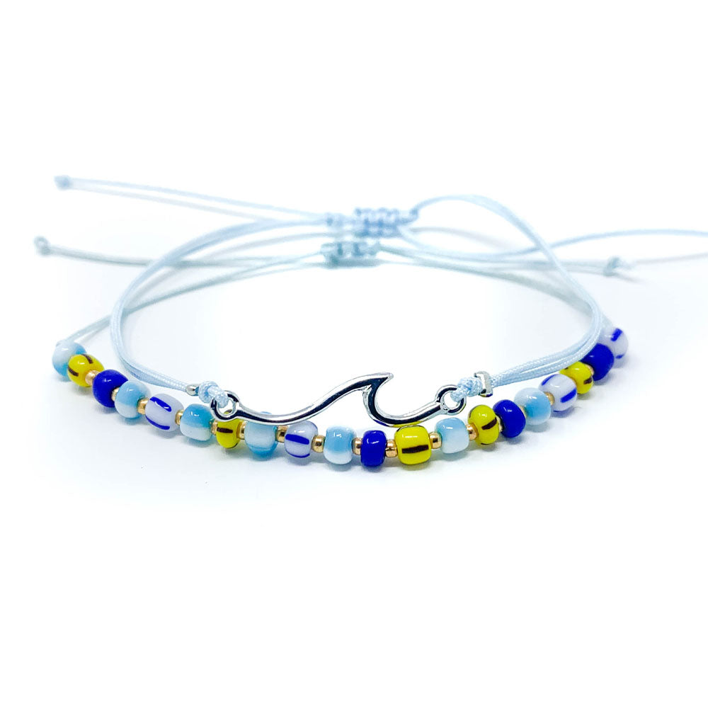 Wave beach bracelet beaded and string light blue