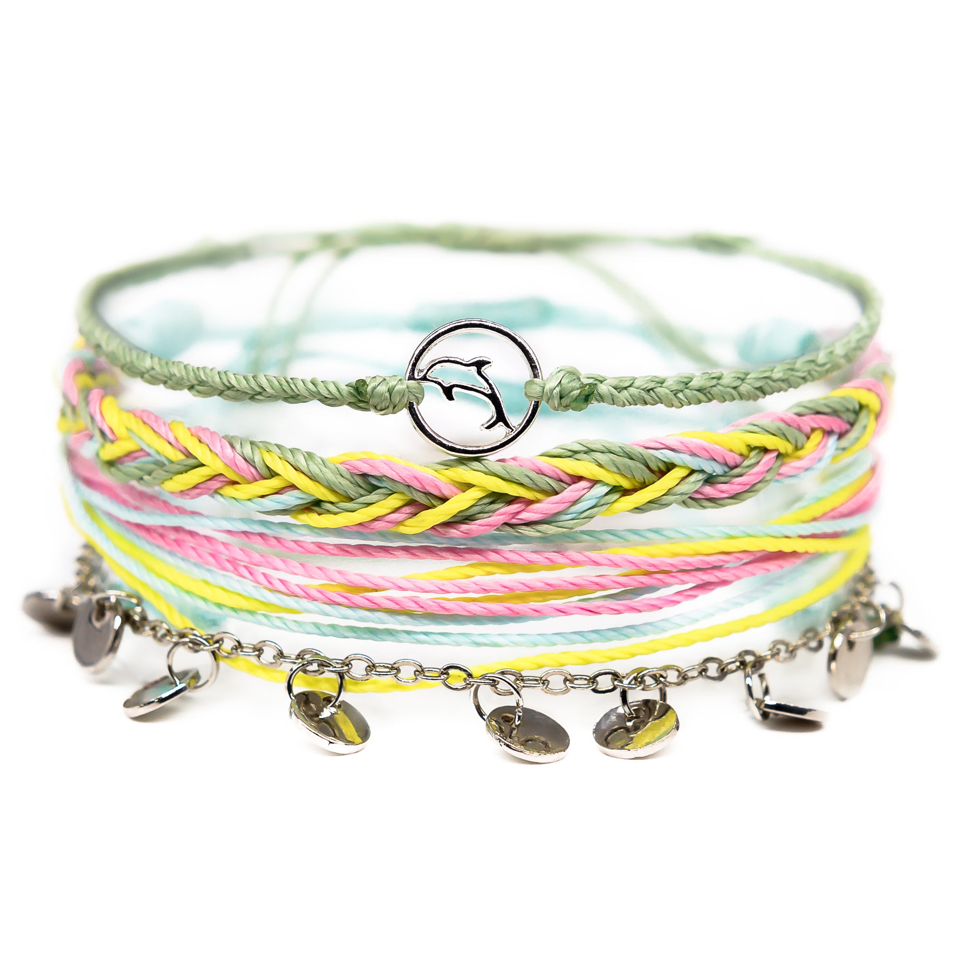 pastel green and yellow dolphin string bracelet stack
